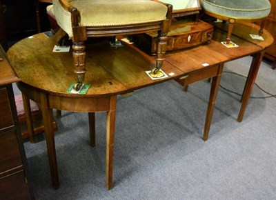 Lot 1140 - A George III D-end dining table