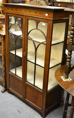 Lot 1155 - An Edwardian display cabinet