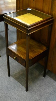 Lot 1163 - A 19th century mahogany single drawer wash stand with cabinet top