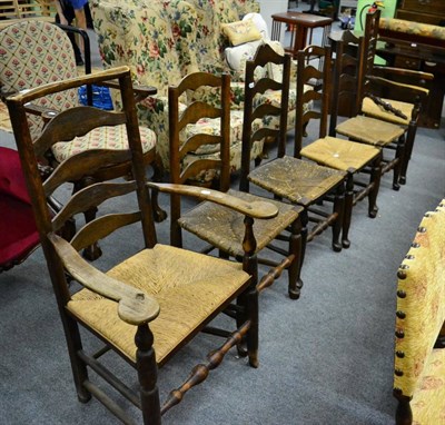 Lot 1170 - A set of six Lancashire style rush seated chairs including two carvers