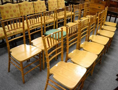 Lot 1172 - A set of twelve faux bamboo dining chairs, with turned spindle back support, 41cm wide