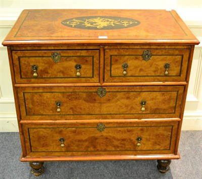 Lot 1175 - A 17th century style burr walnut and marquetry inlaid four drawer chest