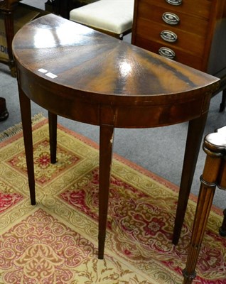 Lot 1186 - A reproduction fold over card table