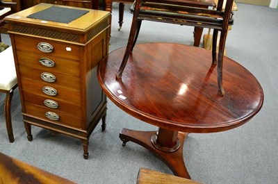 Lot 1188 - Circular breakfast table, together with a mahogany music cabinet