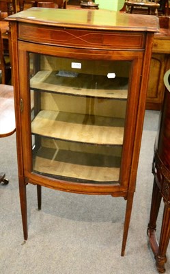 Lot 1192 - Inlaid mahogany bow fronted display cabinet