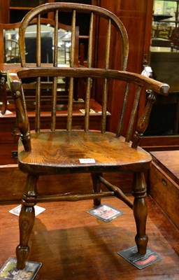 Lot 1196 - Child's oak and elm Windsor armchair