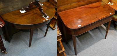 Lot 1202 - George III mahogany fold over tea table, together with mahogany demi lune table of similar date