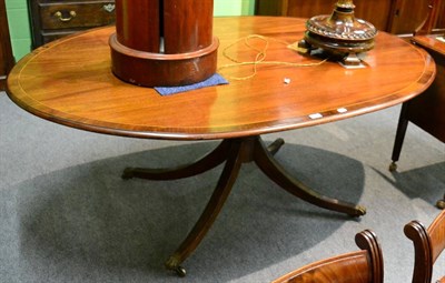 Lot 1205 - A 19th century mahogany dining table of Regency style