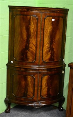 Lot 1214 - Reproduction mahogany bow fronted corner cocktail cabinet