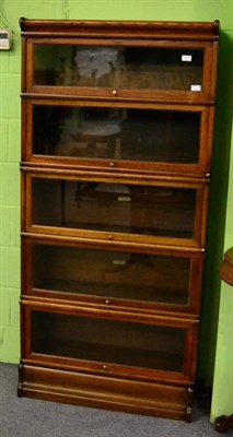 Lot 1217 - A Globe-Wernicke & Co Ltd oak five sectional bookcase, with glazed pivoting doors, 181cm high