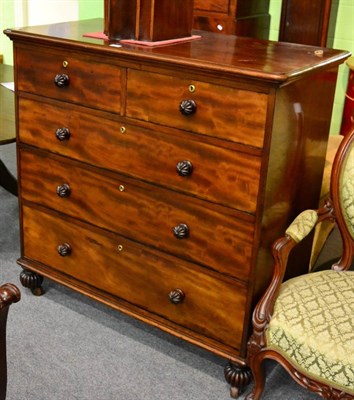 Lot 1221 - A Victorian mahogany five drawer straight fronted chest of drawers, circa 1860, of two short...