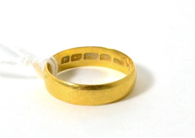 Lot 14 - A 22ct gold band ring, finger size S