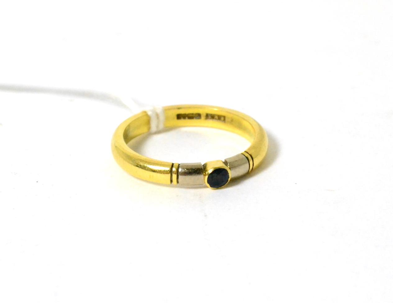Lot 18 - An 18ct gold sapphire ring by Robert Feather