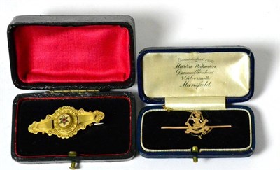 Lot 27 - A Victorian 9ct gold brooch in the Renaissance revival style and a West Riding Regiment pierced...