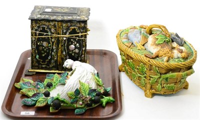 Lot 58 - A majolica game tureen and cover (a.f.), a Continental wall pocket decorated with a cast and a...