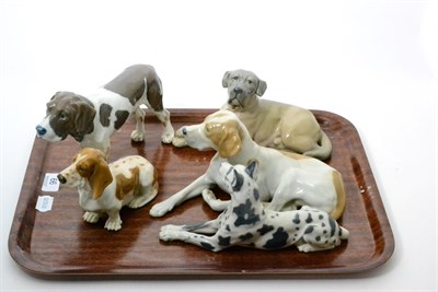 Lot 66 - Five Royal Copenhagen porcelain models of dogs