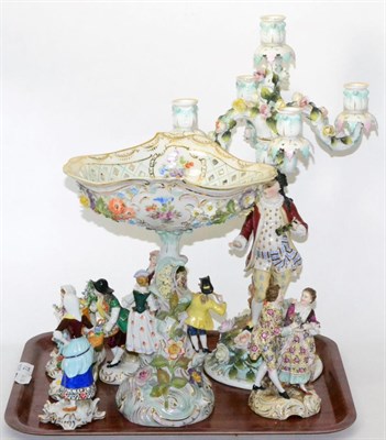 Lot 72 - A collection of German porcelain figures 19/20th century in date comprising a figural candelabra; a