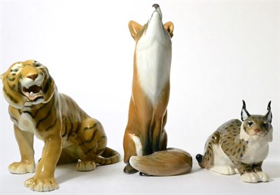 Lot 82 - A large Royal Copenhagen model of a seated fox; another of a lynx; and a Bing & Grondahl model of a