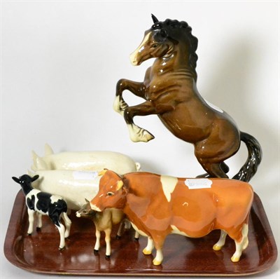 Lot 104 - Six various Beswick pottery animal figures, including 1014, rearing horse