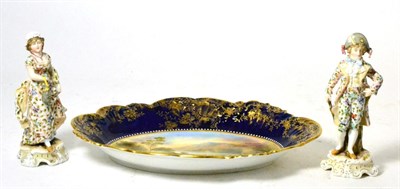 Lot 109 - A 19th century cabinet dish Loch Katrine and a pair of Continental figures (3)