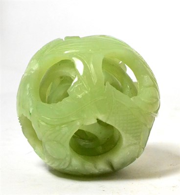 Lot 112 - A Chinese jade puzzle ball