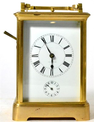 Lot 116 - A brass striking and repeating carriage clock