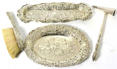 Lot 126 - A silver candle snuffer, two dishes and a brush (4)