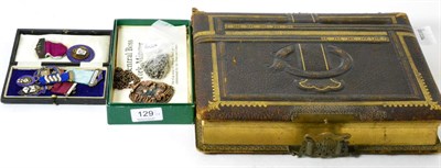 Lot 129 - A 19th century musical photograph album, a silver Albert chain, four Masonic silver jewels and...