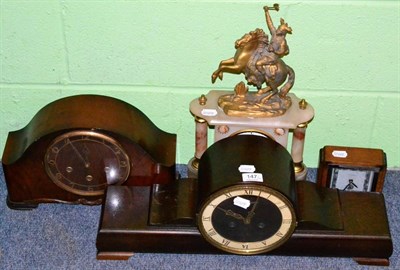 Lot 147 - A 19th century alabaster and gilt metal mounted mantel clock surmounted by a warrior on horse...