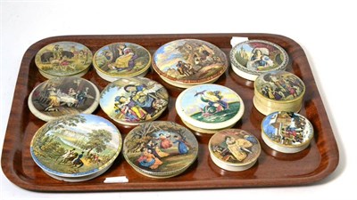 Lot 185 - A collection of twelve Prattware pot lids