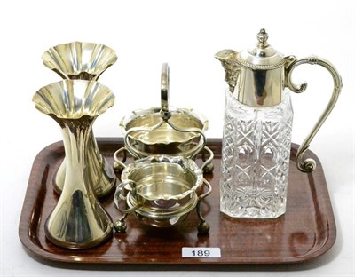 Lot 189 - A pair of silver trumpet shaped vases, London, 1906, together with a plated claret jug, and...