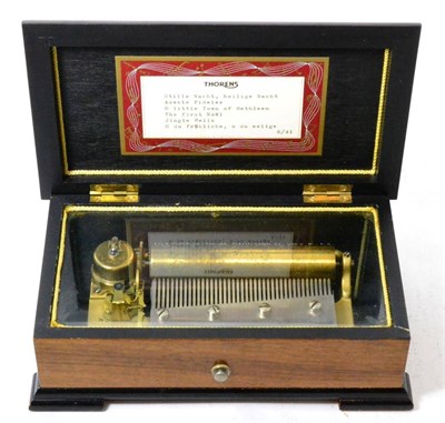 Lot 200 - A modern Swiss key wind cylinder musical box in walnut case