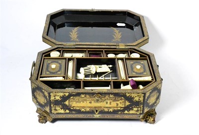 Lot 201 - A 19th century lacquered sewing box with ivory fitments