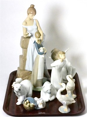 Lot 225 - A collection of ten assorted Lladro figures including a large figure of a girl, various animals etc