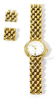 Lot 233 - A Maurice Lacroix lady's gold plated wristwatch, Arabic dial with subsidiary date aperture,...