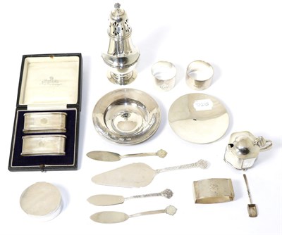 Lot 274 - A mixed group of silver items to include: napkin rings; small armada dish; mustard pot;...