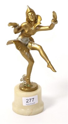 Lot 277 - Art Deco spelter figure modelled as a harlequin pixi, in the manner of Lorenzl, on an alabaster...