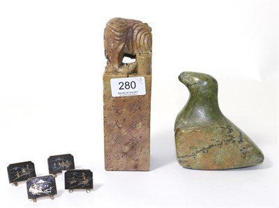 Lot 280 - A Chinese soapstone seal with elephant knop, and a set of four Japanese inlaid menu holders,...