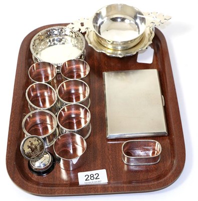 Lot 282 - A quantity of silver including a cigarette case, a wine coaster, a wine taster, a small dish, eight