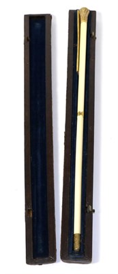 Lot 285 - An early 20th century ivory and gilt baton