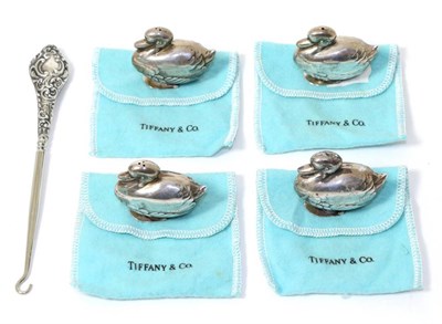 Lot 287 - A set of four Tiffany sterling salt and pepperette ducks, stamped and boxed; together with a silver