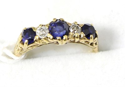 Lot 301 - A sapphire and diamond ring, finger size N, stamped '18ct'