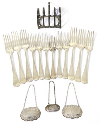 Lot 309 - A set of six George V silver table forks, two George V silver dessert forks, three Victorian silver