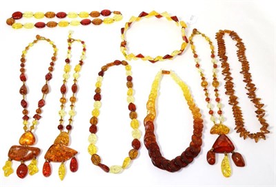 Lot 313 - Eight various amber bead necklaces