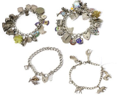 Lot 321 - Four charm bracelets