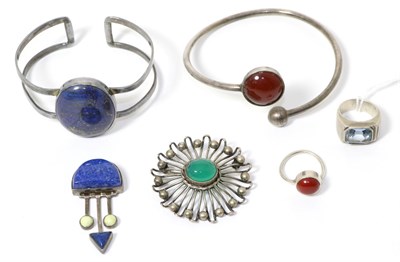 Lot 323 - A Swedish silver chrysophase set brooch, a lapis lazuli set bangle, a carnelian set matching bangle