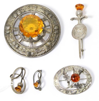 Lot 324 - Five Scottish brooches, including a small Charles Horner example