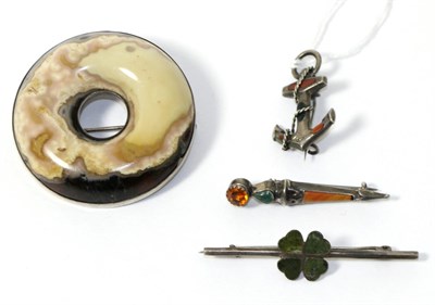 Lot 334 - Four Scottish hardstone brooches