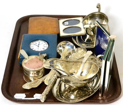 Lot 337 - A group of silver plated items, a small silver photo frame; a pocket chronometer; an Art Deco...