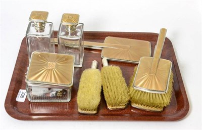 Lot 338 - An Art Deco silver and guilloche enamel eight-piece dressing table set, Birmingham, 1937,...